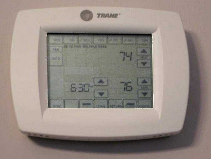A programmable thermostat with a touch screen